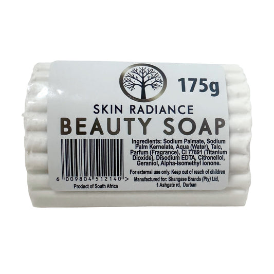 A white bar of Skin Radiance Beauty Soap with a white paper label showing the brand logo, product name, ingredients, barcode, and weight of 175g.